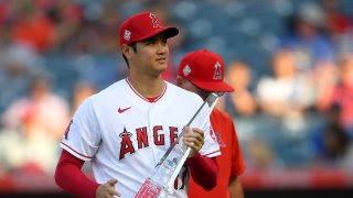 Shohei Ohtani #17 of the Los Angeles Angels was presented with his MVP of the month award before the Seattle Mariners at Angel Stadium of Anaheim on July 16, 2021 in Anaheim, California.