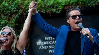 Republican Reps. Marjorie Taylor Greene and Matt Gaetz make an appearance at an America First" rally in California.