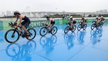 Katie Zaferes of Team United States rides ahead of Georgia Taylor-Brown of Team Great Britain, Jessica Learmonth of Team Great Britain, Vittoria Lopes of Team Brazil, Laura Lindemann of Team Germany and Summer Rappaport of Team United States during the Women's Individual Triathlon on day four of the Tokyo 2020 Olympic Games at Odaiba Marine Park on July 27, 2021, in Tokyo, Japan.