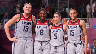 Stefanie Dolson, Jacquelyn Young, Kelsey Plum and Allisha Gray of Team United States pose for a portrait after winning the gold medal in the 3x3 Basketball competition on day five of the Tokyo 2020 Olympic Games at Aomi Urban Sports Park on July 28, 2021 in Tokyo, Japan.