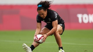 Portia Woodman of Team New Zealand scores a try.