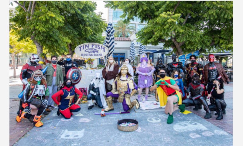 Comic-Con fans have created a shrine outside the Tin Fish restaurant to honor SDCC which was moved online due to the pandemic.