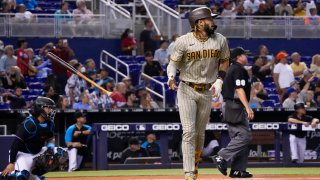 MIAMI, FLORIDA – JULY 24: Fernando Tatis Jr. #23 of the San Diego Padres hits a solo in the first inning against the Miami Marlins at loanDepot park on July 24, 2021 in Miami, Florida. (Photo by Mark Brown/Getty Images)