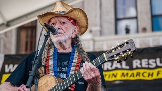 American musician Willie Nelson performs during the Georgetown to Austin March for Democracy rally on July 31, 2021 in Austin, Texas. Texas activists and demonstrators rallied at the Texas state Capitol after completing a 27-mile long march, from Georgetown to Austin, demanding federal action on voting rights legislation.