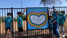 "Be Kind" reads a painting created by members of the Boys & Girls Club of Vista.