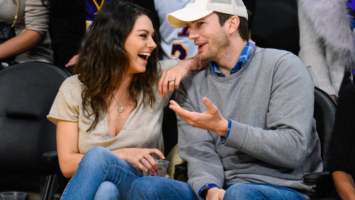 Watch Ashton Kutcher Hilariously Catch Mila Kunis in the Act of