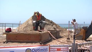 Sand sculpting artists are creating the largest sandcastle seen in Imperial Beach.