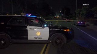 San Diego police respond to the scene of a shooting on Tuesday, Aug. 10, 2021 in Logan Heights.