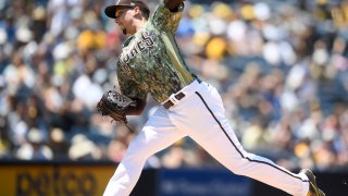 SAN DIEGO, CA – AUGUST 8: Blake Snell #4 of the San Diego Padres pitches during the first inning of a baseball game against Arizona Diamondbacks at Petco Park on August 8, 2021 in San Diego, California. (Photo by Denis Poroy/Getty Images)