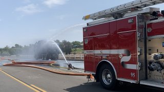 Cal Fire Riverside firefighters were hospitalized after a dump truck exploded in Temecula