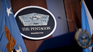 The Pentagon seal in the Pentagon Briefing Room in Arlington, Virginia., U.S., on Wednesday, Sept. 1, 2021. President Biden yesterday declared an end to two decades of U.S. military operations in Afghanistan, offering an impassioned defense of his withdrawal and rejecting criticism that it was mishandled.