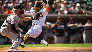 SAN DIEGO, CA – SEPTEMBER 23: Fernando Tatis Jr #23 of the San Diego Padres slides into home plate after tagging up in the first inning against the San Francisco Giants on September 23, 2021 at Petco Park in San Diego, California. (Photo by Matt Thomas/San Diego Padres/Getty Images)