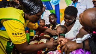 A health worker vaccinates a child against malaria in Ndhiwa, Homabay County, western Kenya on September 13, 2019 during the launch of malaria vaccine in Kenya.