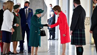 Britain's Queen Elizabeth II is greeted by Scotland's First Minister Nicola Sturgeon