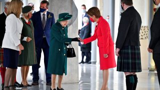 Britain's Queen Elizabeth II is greeted by Scotland's First Minister Nicola Sturgeon