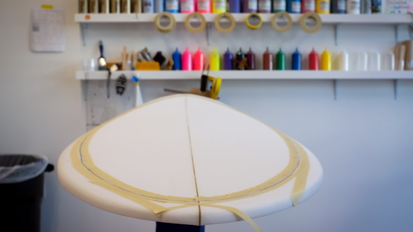 A surfboard blank sits in the room used for the UC San Diego class on shaping surfboards.