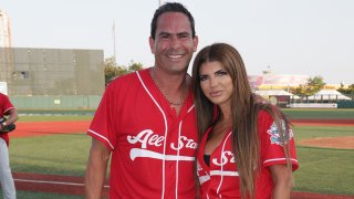 Luis Ruelas and Teresa Giudice of The Real Housewives of New Jersey attend the 2021 Battle for Brooklyn celebrity softball game at Maimonides Park, Coney Island on August 12, 2021 in New York City