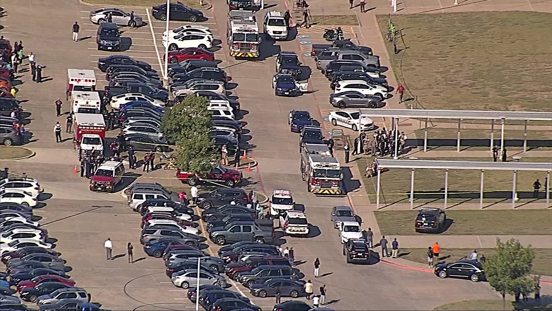 Law enforcement converge on Timberview High School in Arlington, Texas, on Wednesday, Oct. 6, 2021.