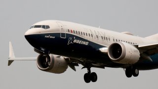 A Boeing 737 MAX 7 aircraft lands during an evaluation flight at Boeing Field in Seattle, Washington, September 30, 2020.
