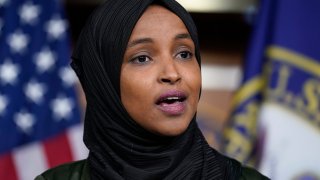 Rep. Ilhan Omar, D-Minn., speaks to reporters in the wake of anti-Islamic comments made last week by Rep. Lauren Boebert, R-Colo., who likened Omar to a bomb-carrying terrorist, during a news conference at the Capitol in Washington, Tuesday, Nov. 30, 2021.