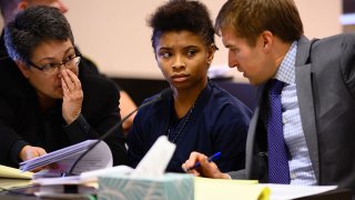 FILE - Chrystul Kizer, center, is pictured during a hearing in the Kenosha County Courthouse on Nov. 15, 2019.