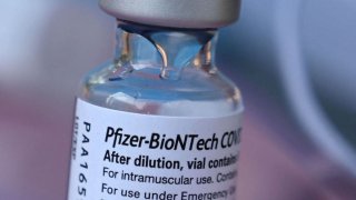 A vial of Pfizer-BioNTech Covid-19 vaccine is seen
