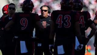 CARSON, CA – NOVEMBER 26: Brady Hoke head coach of the San Diego State Aztecs stands on the field against the Boise State Broncos on November 26, 2021 at Dignity Health Sports Park in Carson, California. (Photo by Tom Hauck/Getty Images)