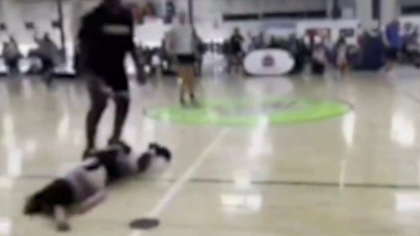 A teen was left with a concussion after another teen girl was caught on camera punching her at a Garden Grove girls’ basketball game Sunday.