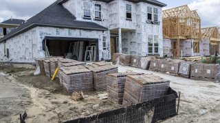 Construction materials for a new home being built by CastleRock Communities in the Sunfield neighborhood of Buda, Texas, U.S., on Wednesday, Nov. 10, 2021.