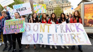 Protesters seen holding placards calling for a stop to the Williams natural gas pipeline (aka ‘Northeast Supply Enhancement (NESE) Pipeline”) during a demonstration held on Centre Street adjacent to City Hall Park in New York City.