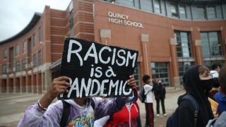 racism is a pandemic as dozens of Quincy High School students walk out