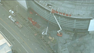 NewsChopper4 Alpha captures crews removing the iconic Staples Center lettering and logos from the outside of the stadium, to make way for its new identity as the Crypto.com Arena.