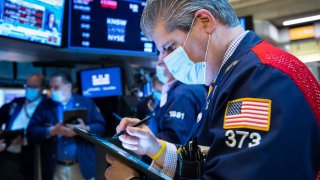 Traders on the floor of the NYSE, Jan. 21, 2022.