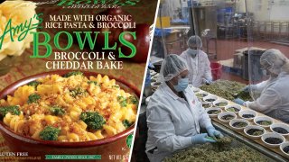 A box of Amy's Kitchen broccoli and cheddar bowl, left, and Workers wearing protective gear at an Amy's Kitchen facility in Santa Rosa.