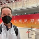 Steven Luke takes a selfie at the Beijing Airport as he arrives for the 2022 Winter Olympics, Jan. 29, 2022.