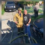 Pasadena Fire Capt. William Basulto (right) is pictured at the scene of a fire Sunday Jan. 30, 2022 in East LA.