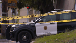 police tape and patrol vehicle