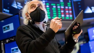 Traders on the floor of the NYSE, Feb. 9, 2022.