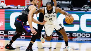 James Harden #13 of the Brooklyn Nets drives against Ben Simmons #25 of the Philadelphia 76ers during the third quarter at Wells Fargo Center on February 06, 2021 in Philadelphia, Pennsylvania.