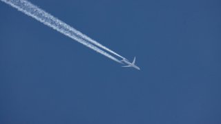 An airplane photographed in skies over the Netherlands in April 2021.