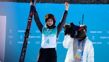 Eileen Gu, of China, reacts after winning the women's freestyle skiing big air finals of the 2022 Winter Olympics, Tuesday, Feb. 8, 2022, in Beijing.