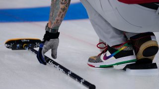 United States' Matt Hamilton, competes, during the men's curling match against the Russian Olympic Committee, at the 2022 Winter Olympics, Wednesday, Feb. 9, 2022, in Beijing.