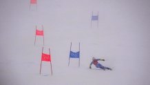 Luca De Aliprandini, of Italy passes a gate during the first run of the Men's Giant Slalom at the 2022 Winter Olympics, Feb. 13, 2022, in the Yanqing district of Beijing, China.