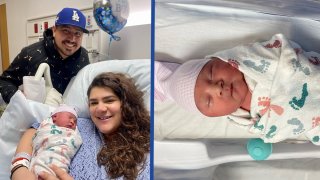 A picture of parents Natalie and Angel Hernandez and their baby boy Ramon who was born on 2:22 p.m. on 2/2/22