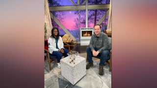 Erin Jackson (left) who made history, becoming the first Black woman to win a speed skating medal by taking home gold in the women's 500m final in Beijing, sits next to NBC 7 anchor Steven Luke, Feb. 13, 2022.