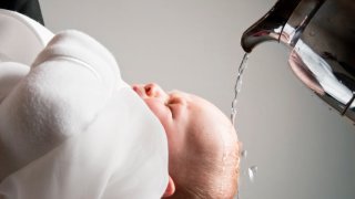 A baby being baptized