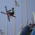 Norway's Birk Ruud carries a Norwegian flag during his final run during the Freestyle Skiing Men's Big Air final during the 2022 Winter Olympics at the Big Air Shougang in Beijing, China on Feb. 9, 2022. Ruud won gold in the event.