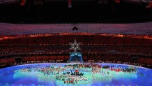 Delegations gather inside the stadium during the closing ceremony at the 2022 Winter Olympics Closing Ceremony, Feb. 20, 2022 in Beijing.