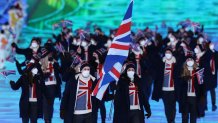 Flag bearers Eve Muirhead and Dave Ryding of Team Great Britain lead the team during the Opening Ceremony of the Beijing 2022 Winter Olympics at the Beijing National Stadium, Feb. 4, 2022, in Beijing, China.