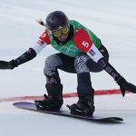 Lindsey Jacobellis of Team United States reacts crossing the finish line to win the gold medal during the Women's Snowboard Cross Big Final on day five of the 2022 Winter Olympics at Genting Snow Park on Feb. 9, 2022, in Zhangjiakou, China.